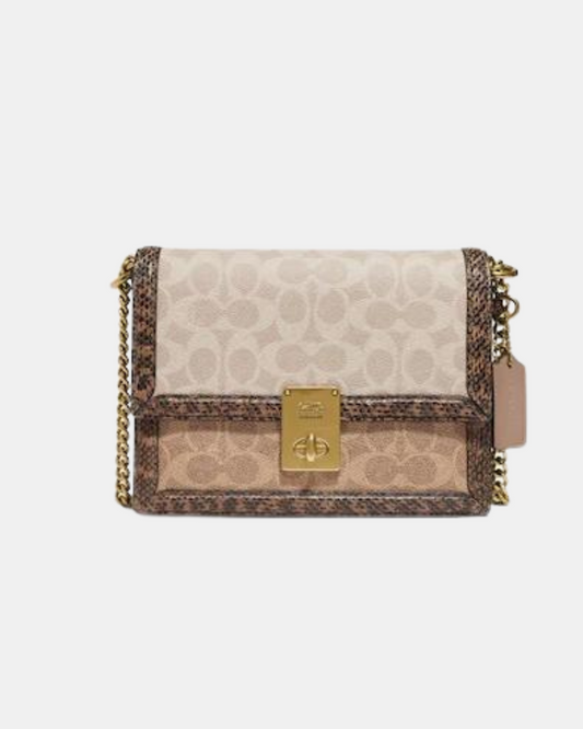 COACH HUTTON SHOULDER BAG IN BLOCKED SIGNATURE CANVAS WITH SNAKESKIN DETAIL